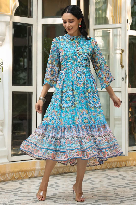 Jashvi Aqua Blue Geometric Printed Chiffon Tiered Maxi Dress With Buttons. Stylish One-Shoulder Maxi Dress Jashvi Aqua Blue Geometric Printed Chiffon Tiered Maxi Dress With Buttons. Stylish One-Shoulder Maxi Dress