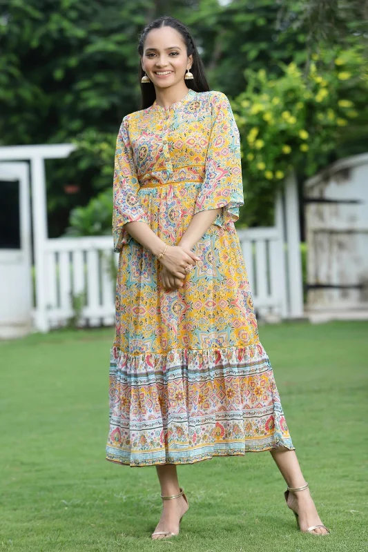 Jashvi Mustard Geometric Printed Chiffon Tiered Maxi Dress With Buttons. Comfortable Plunging Neckline Maxi Dress Jashvi Mustard Geometric Printed Chiffon Tiered Maxi Dress With Buttons. Comfortable Plunging Neckline Maxi Dress
